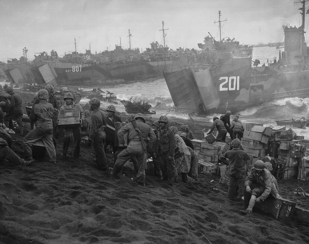 U.S troops landing supplies at Iwo Jima in World War II
