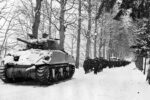 tank and soldiers during battle of the bulge